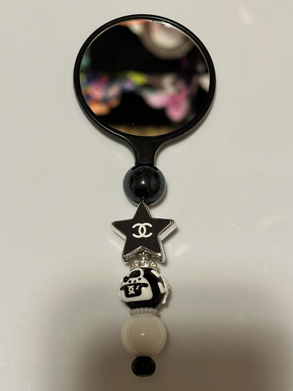 Black compact Chanel Mirror