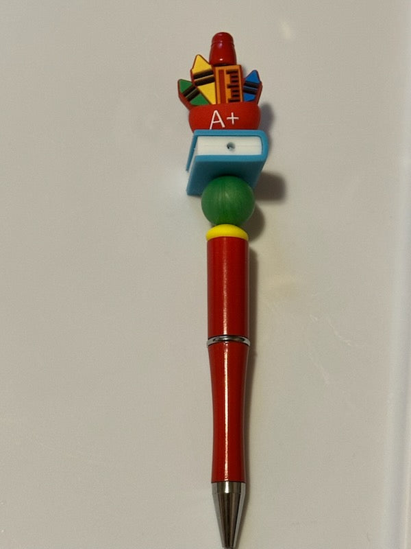 Crayons and book pen