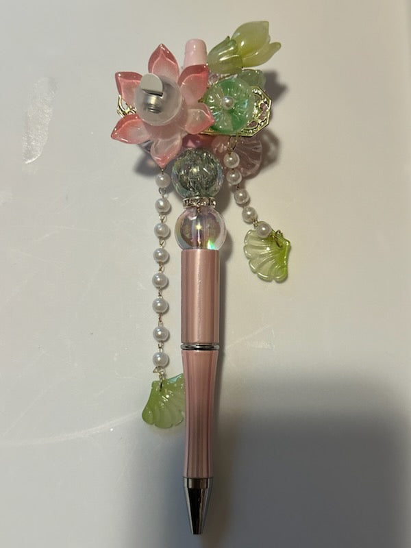 Fancy pink and light green flower pen