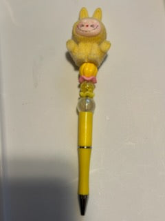 Yellow labubu pen