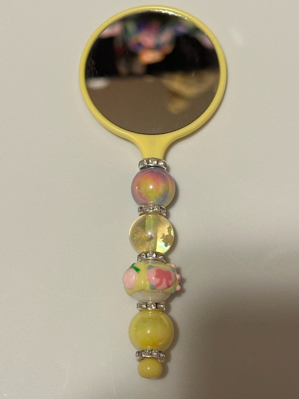 Yellow compact mirror