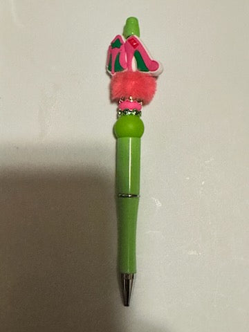 AKA heels on green pen