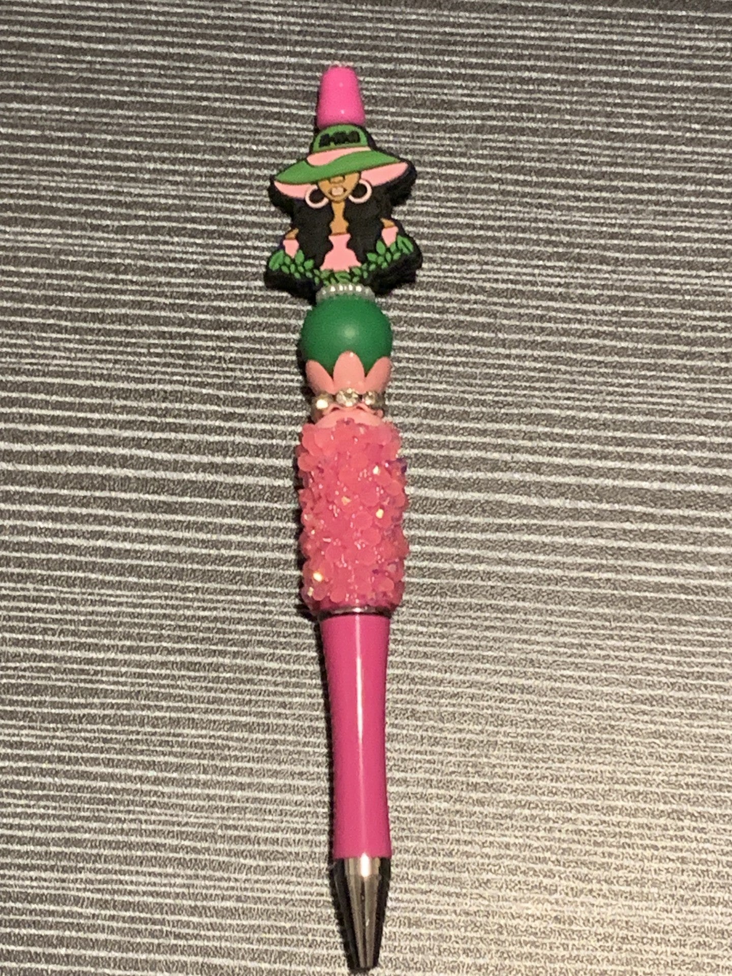 AKA lady on pink sparkle pen