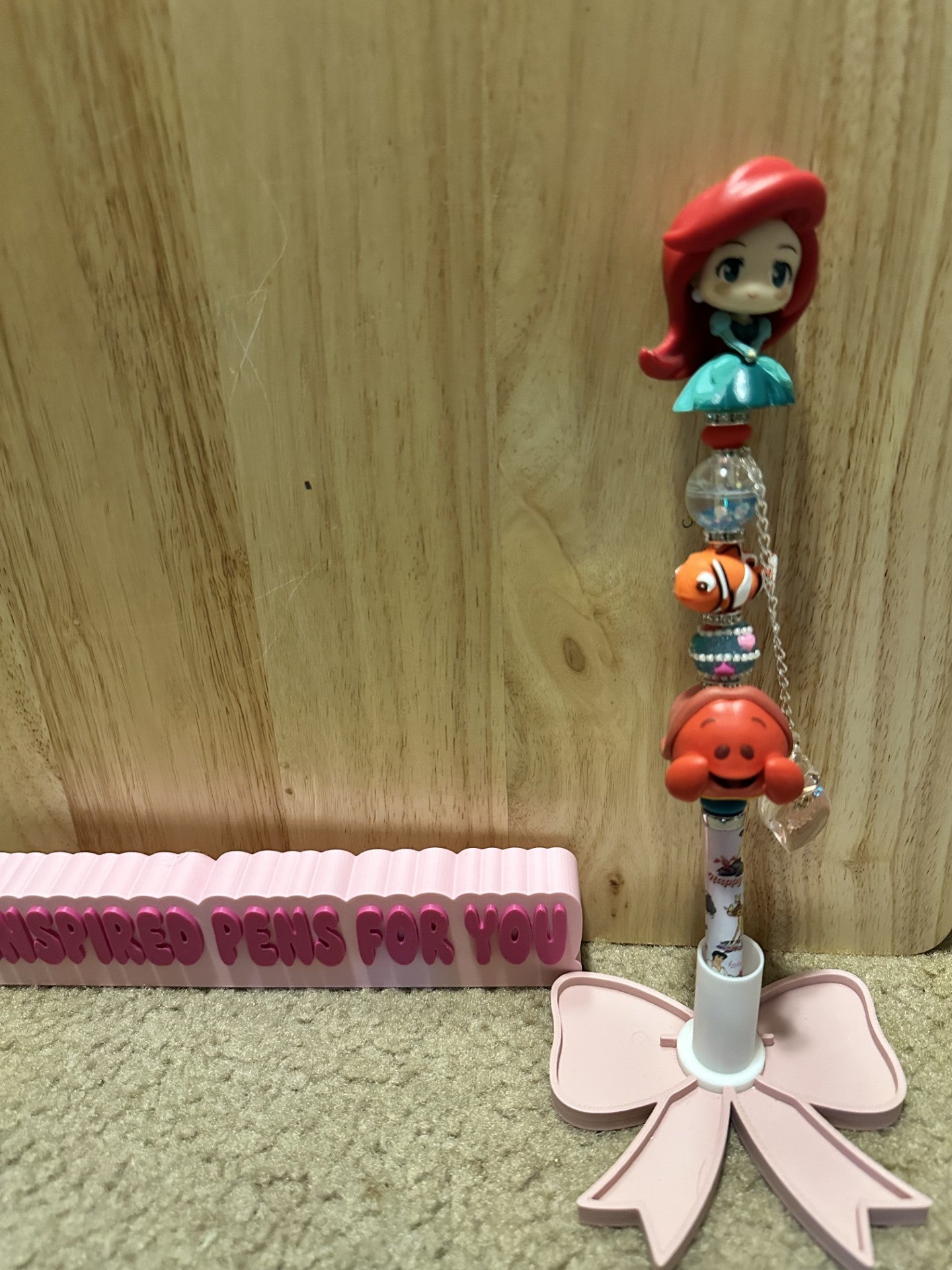 Ariel with Sabastian pen