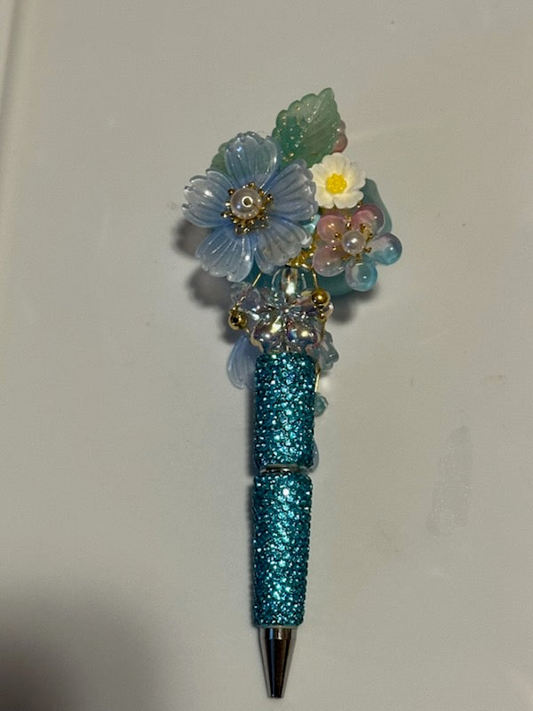 Big fancy light blue flower pen