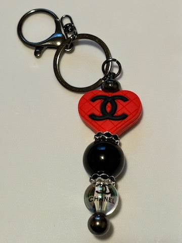 Black and red chanel keychain