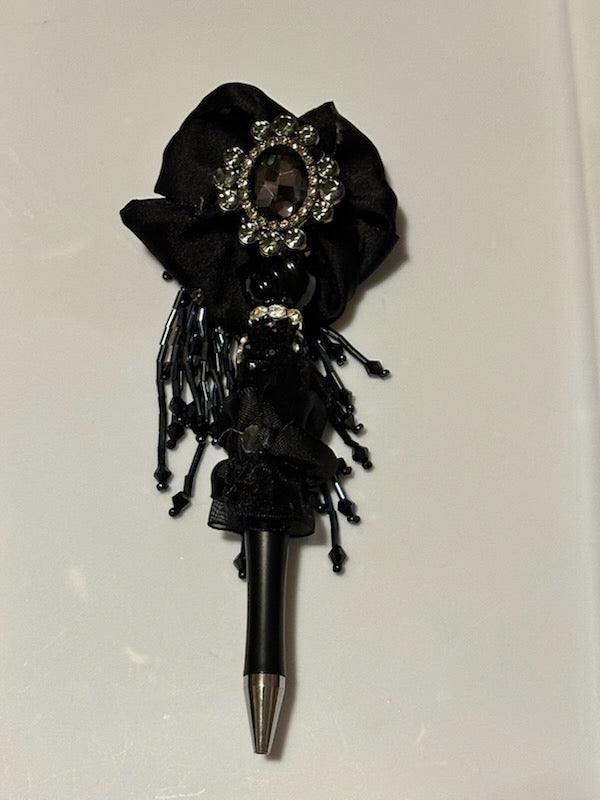 Black flower on fancy black pen