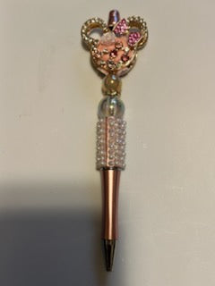 Gold and pink Minnie head pen
