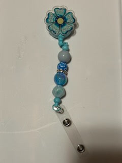 Blue flower badge holder