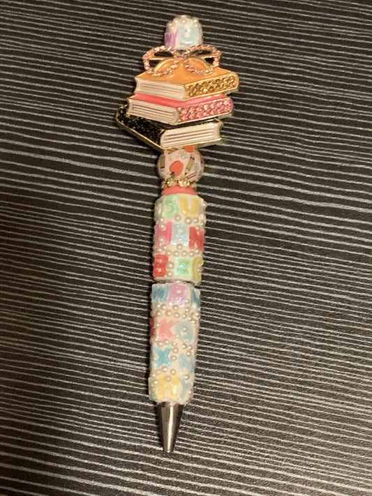 Books on a letter pen