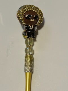 Brown guy wearing yellow sombrero hat pen