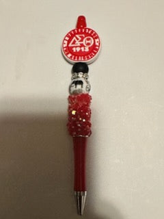 Delta on bling red pen