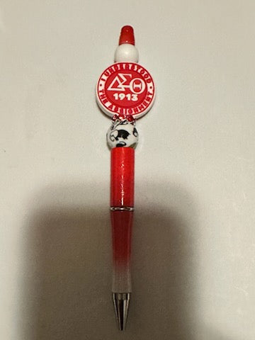 Delta on red and white pen