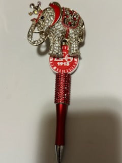 Delta with an elephant charm