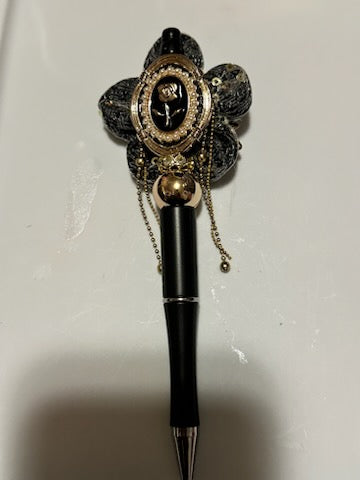 Fancy black and gold flower