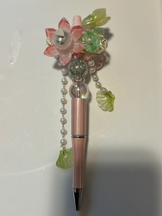 Fancy pink and light green flower pen
