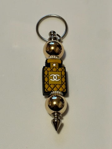 Gold chanel perfume keychain