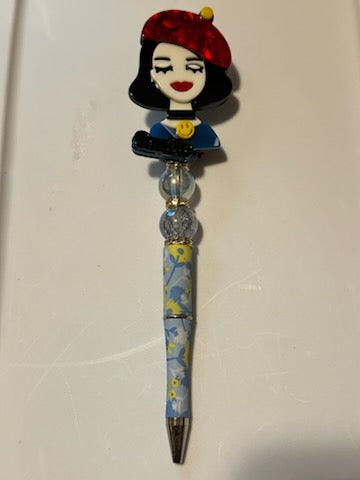 Lady with red hat pen