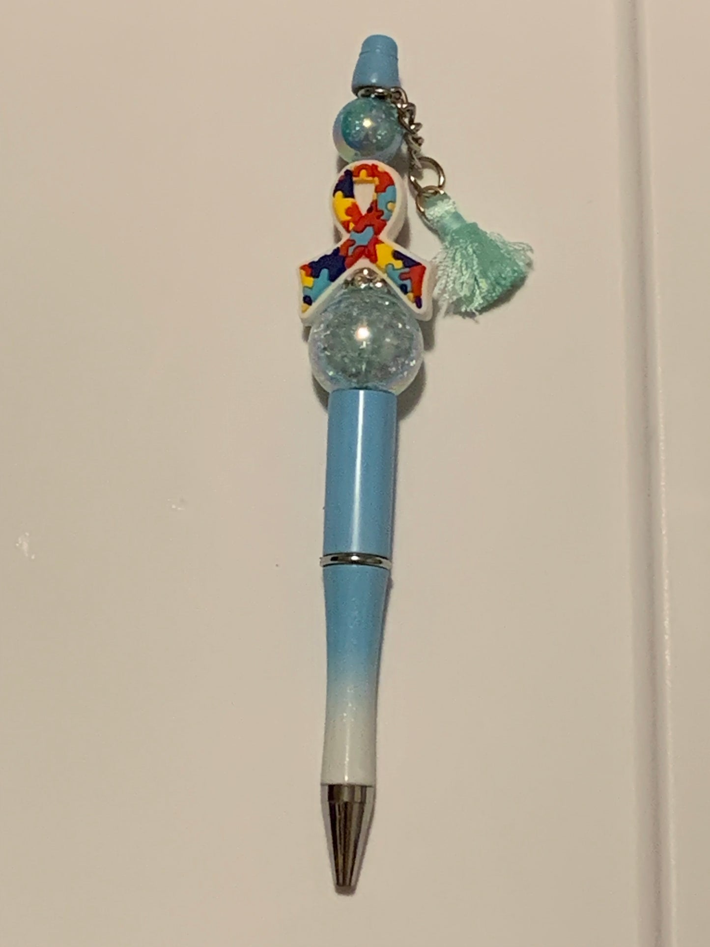 Light blue autism pen