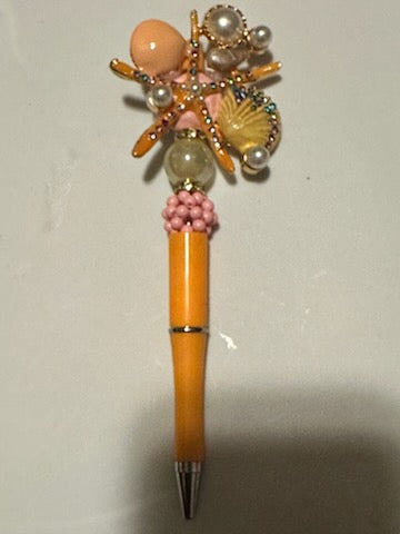 Orange Starfish and sea shells pen