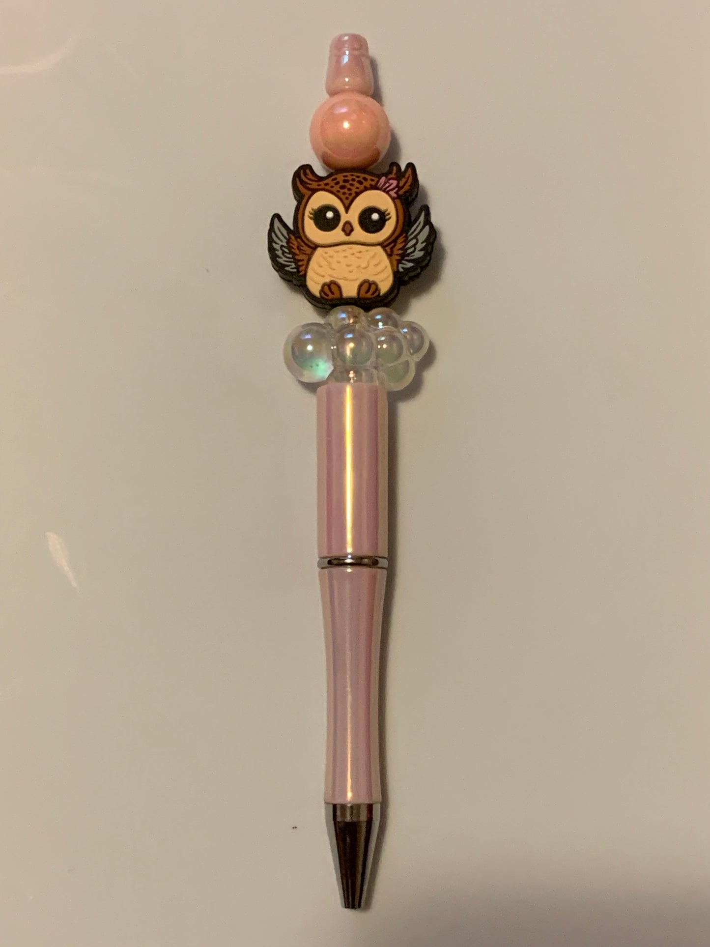 Owl on pink pen