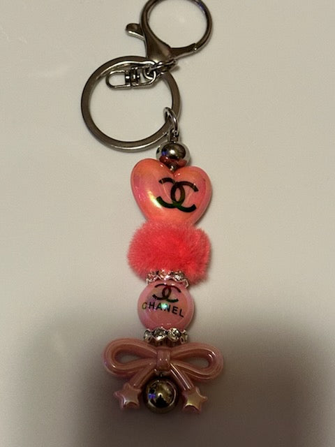 Pink Chanel heart with bow keychain