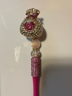 Bling pink and gold money bag