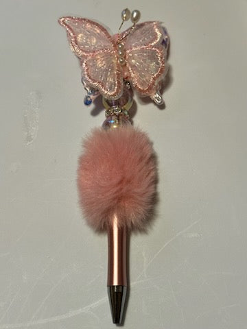Pink butterfly on fuzzy pen