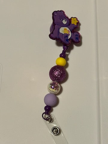 Purple Care Bear badge holder