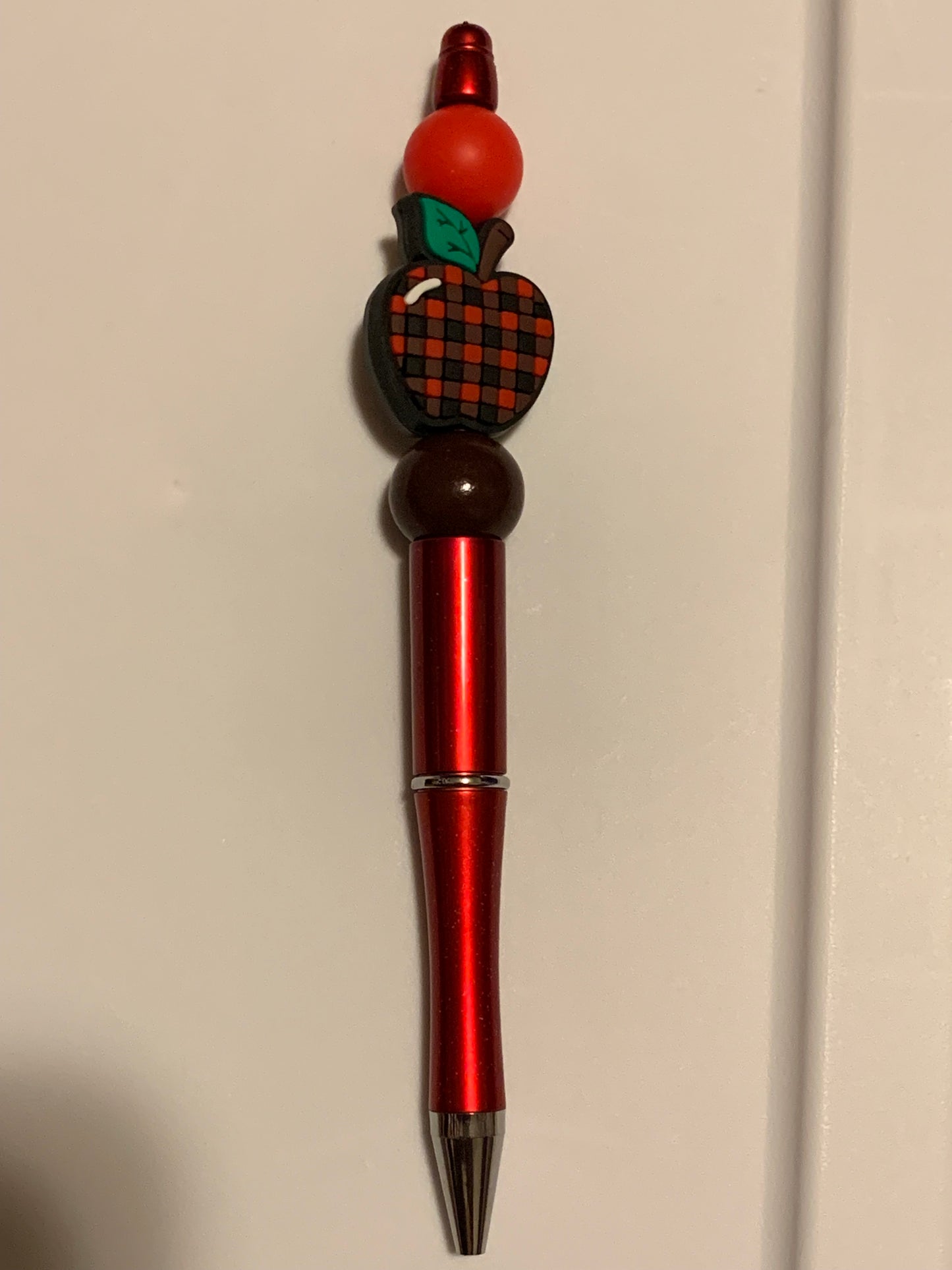 Red apple pen