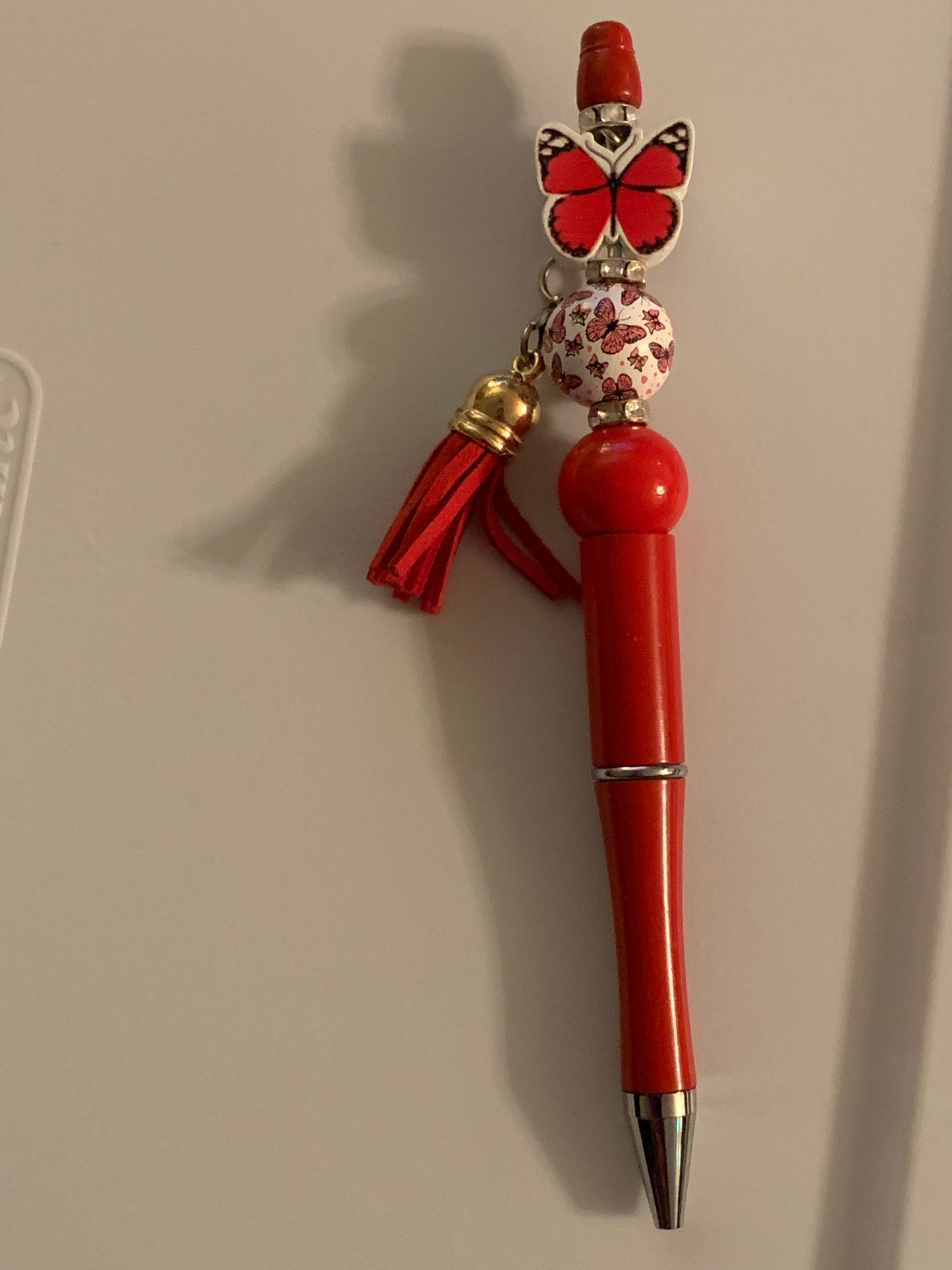 Red butterfly pen