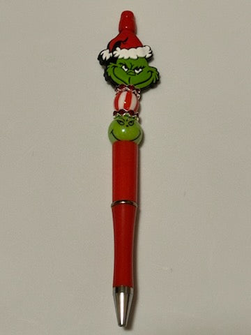 Red hat Grinch pen