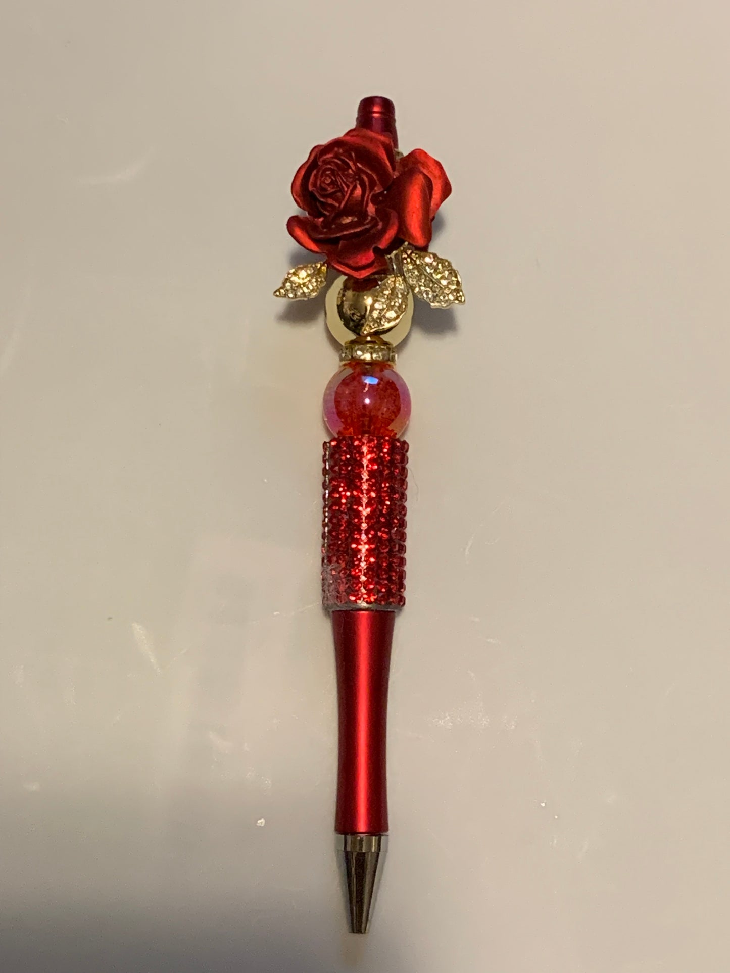 Red and gold rose pen