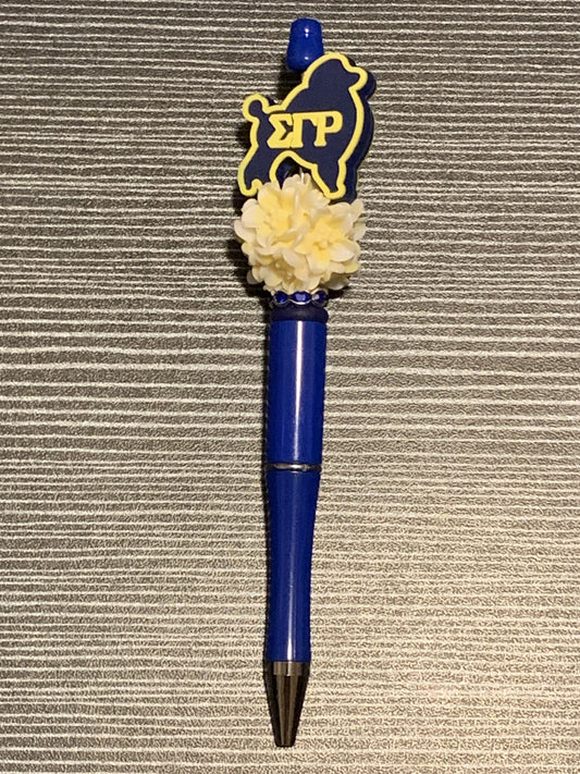 Sigma Gamma Rho poodle on blue pen