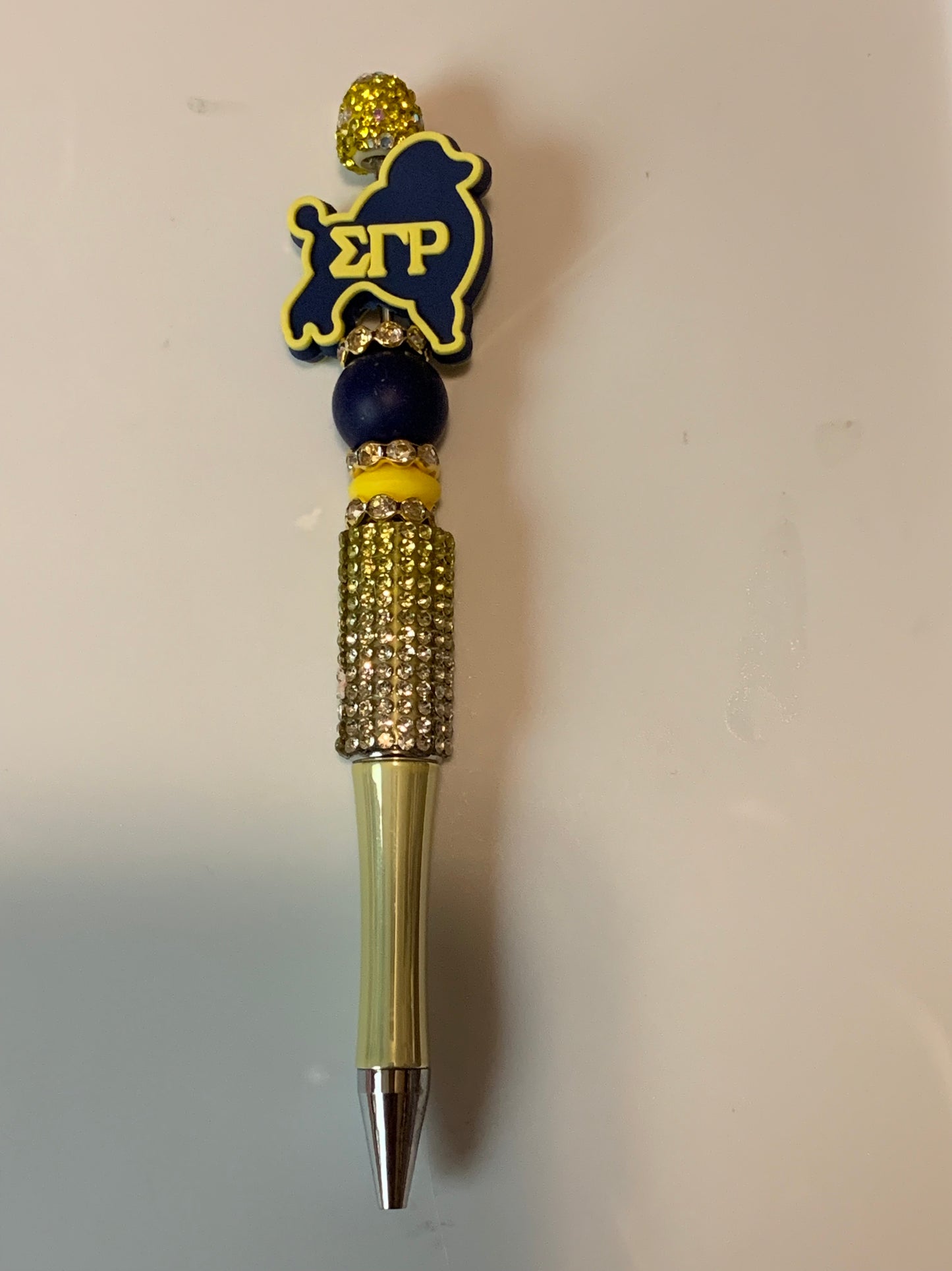 Sigma Greek letters on a poodle pen