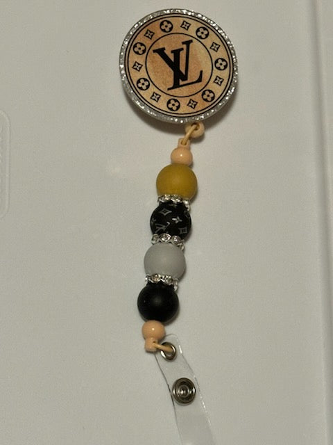 Tan LV badge holder