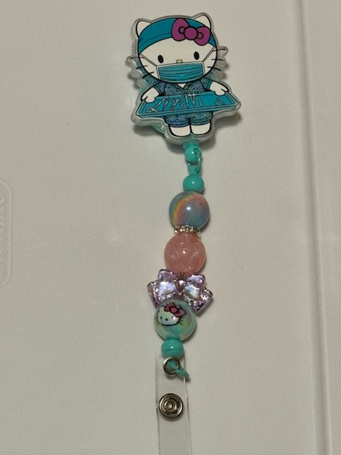 Teal nurse Hello Kitty badge holder