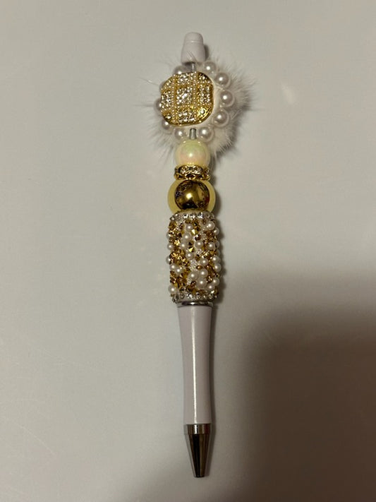 White and gold fancy pen