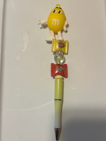 Yellow M M pen