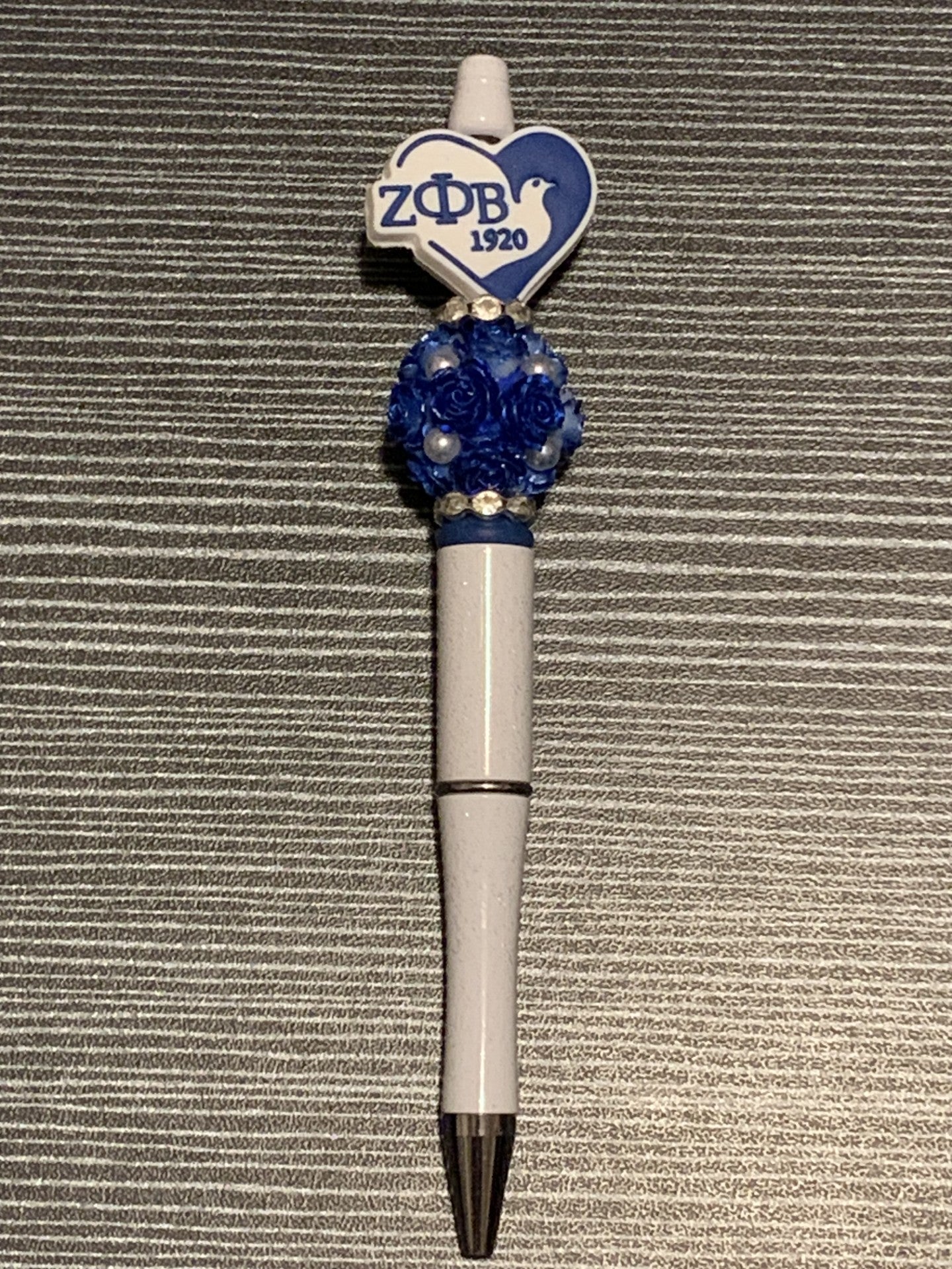 Zeta Phi Beta dove on white pen
