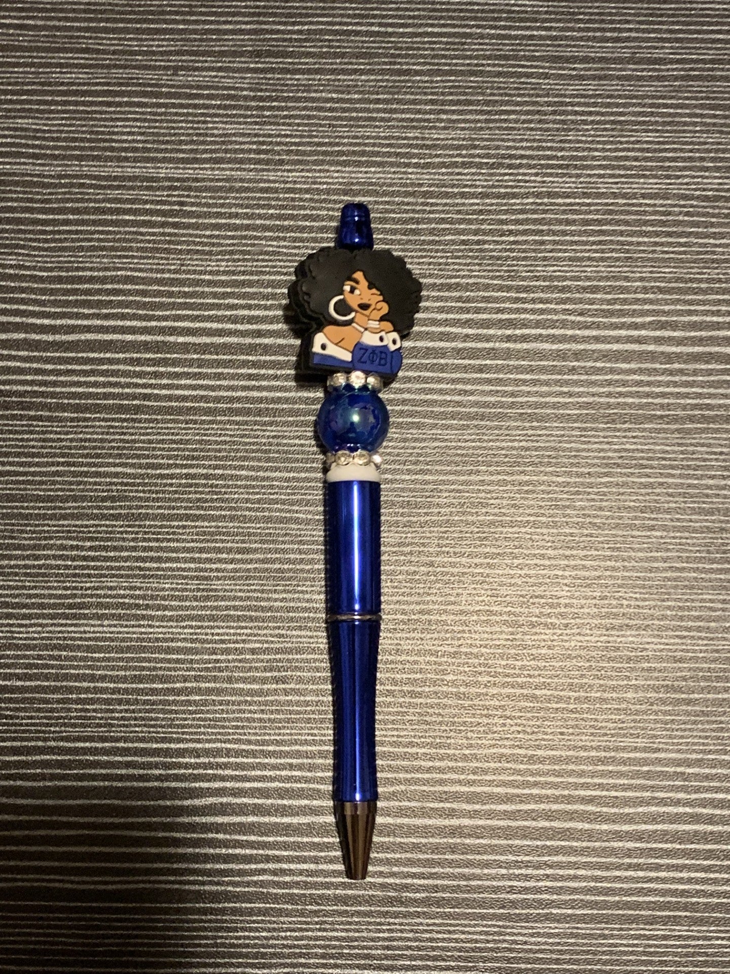 Zeta girl on blue pen