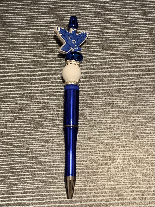 Zeta hand sign on blue pen