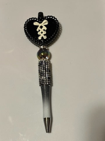 Black heart with white tie pen