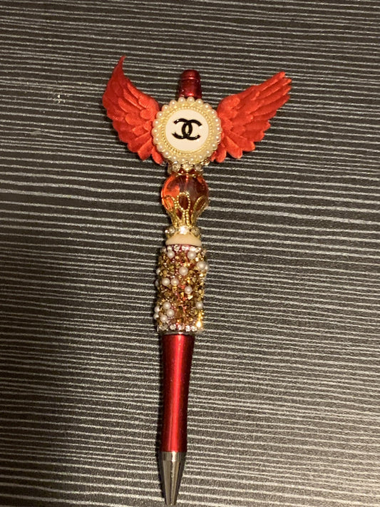 Red and Gold Chanel with wings