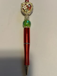 Two flowers on red pen
